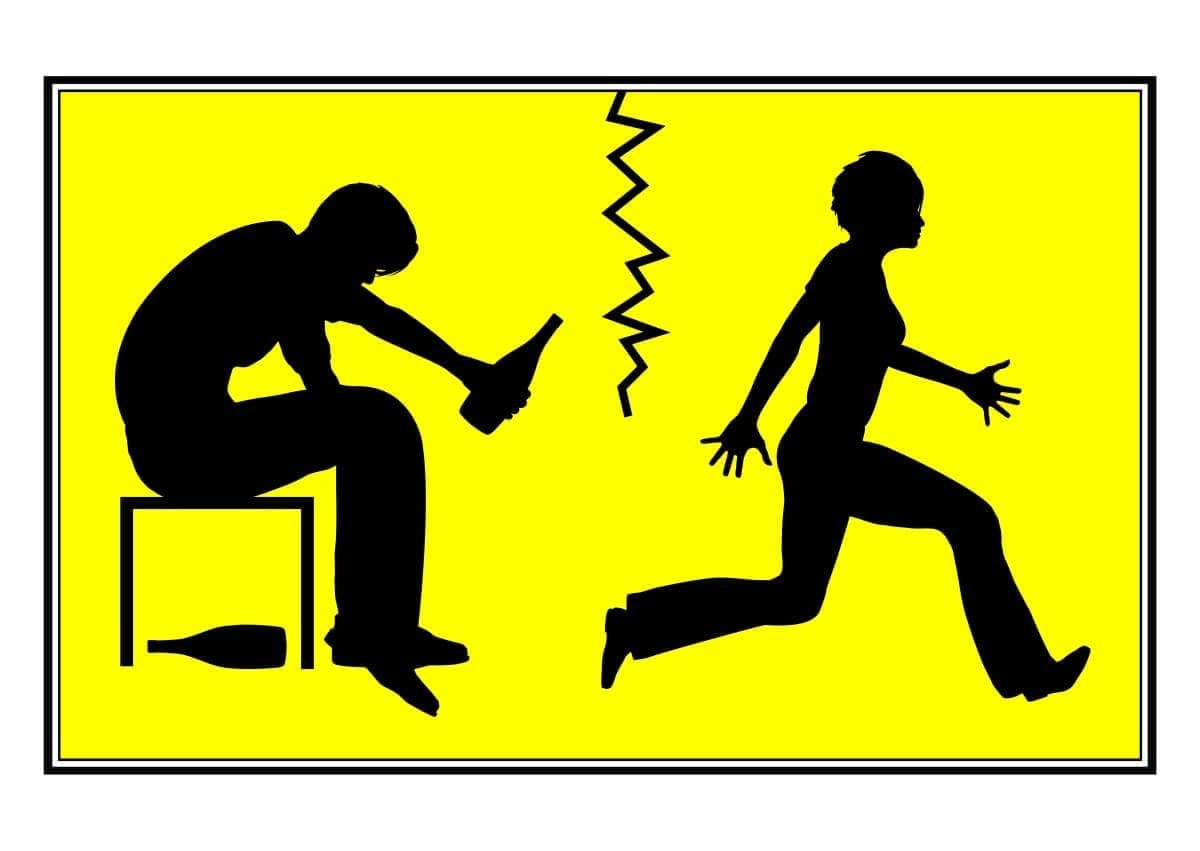 A silhouette of a man and woman running away from each other towards an addiction recovery center.