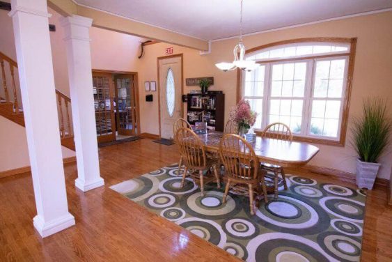 Dining together is part of a supportive community experience, explains Prosperity Haven.