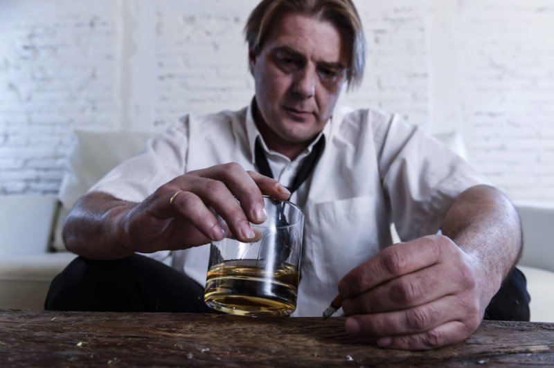 Sad,Depressed,Alcoholic,Businessman,On,His,40s,With,Loose,Necktie Sad,Depressed,Alcoholic,Businessman,On,His,40s,With,Loose,Necktie